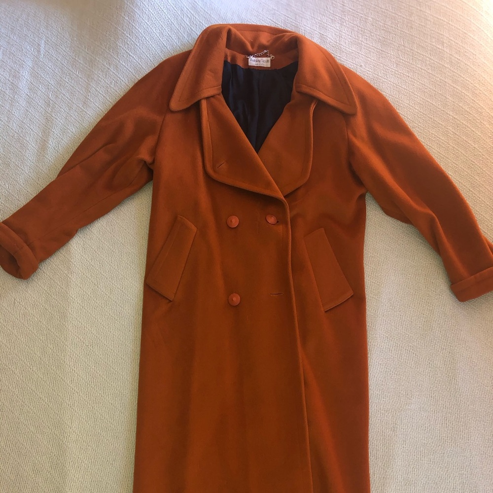 Full length Ashely Scott orange trench coat